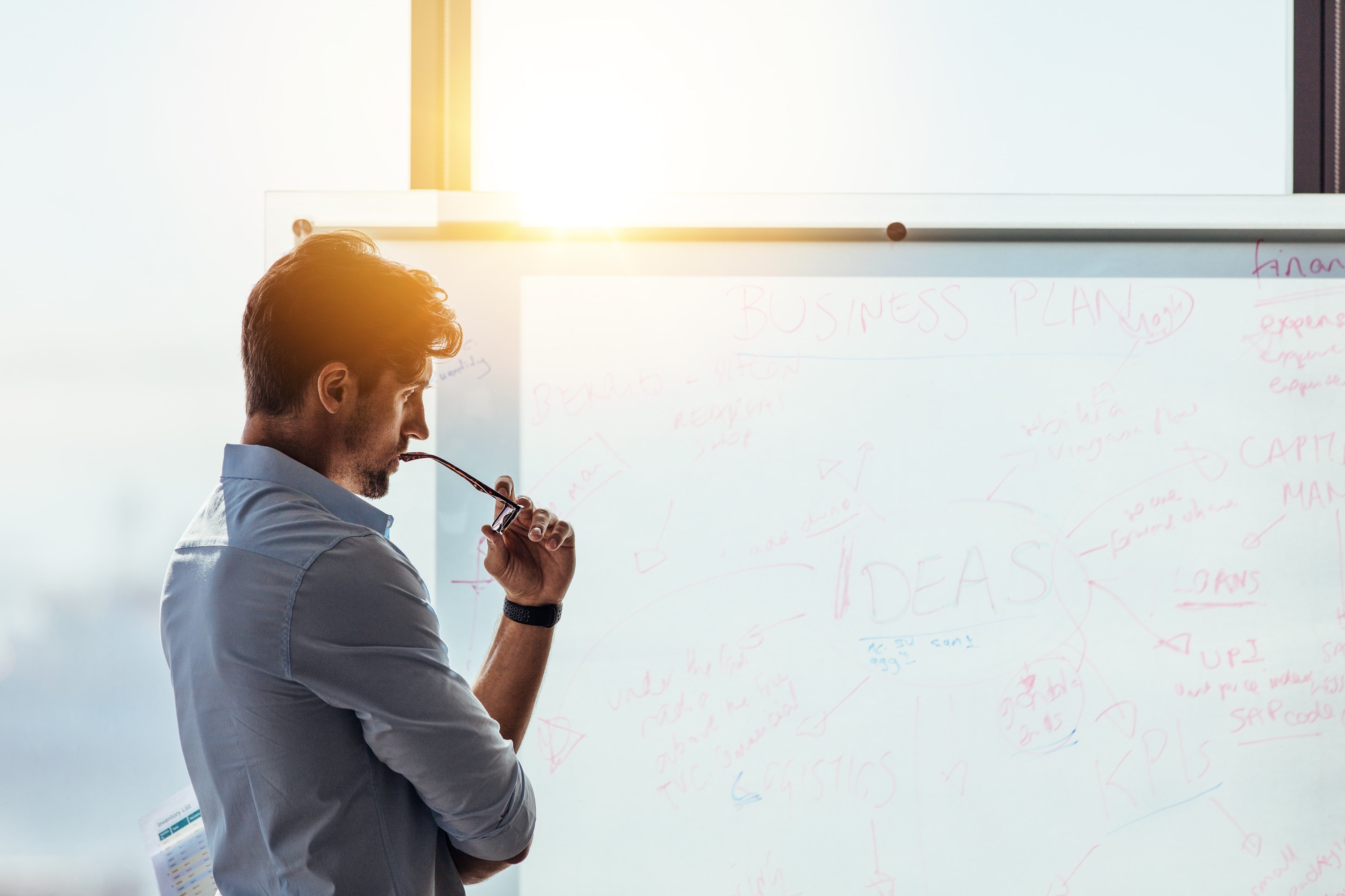 man at whiteboard